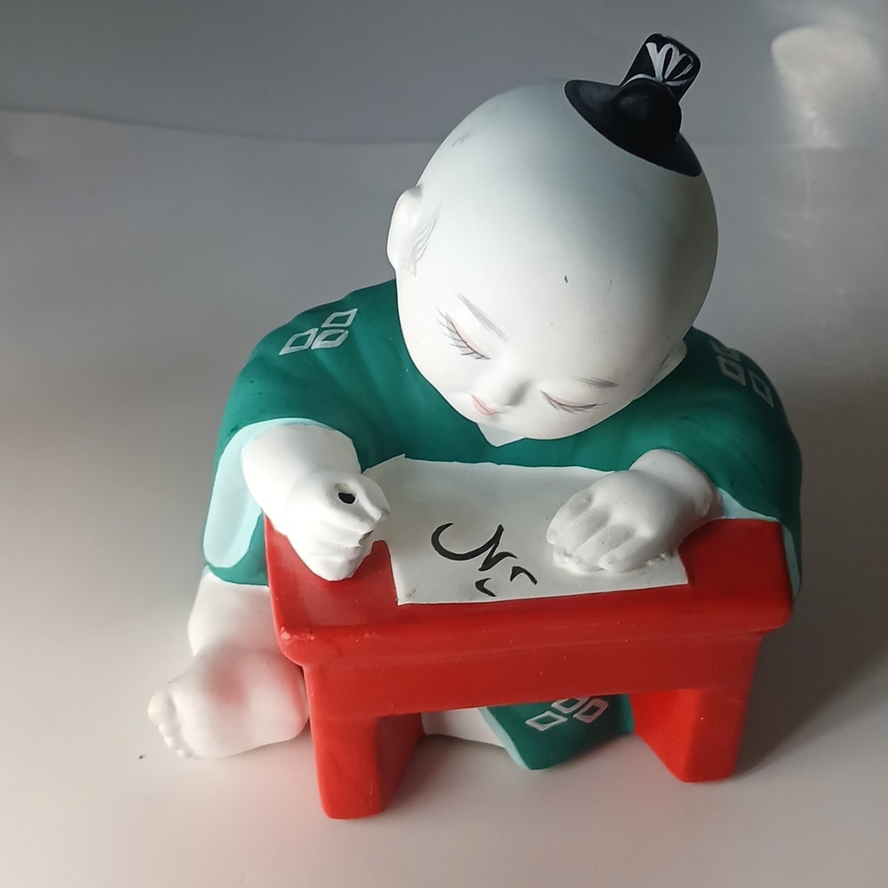 Vintage Figurine with Red Education Diligence And Taditional  Culture